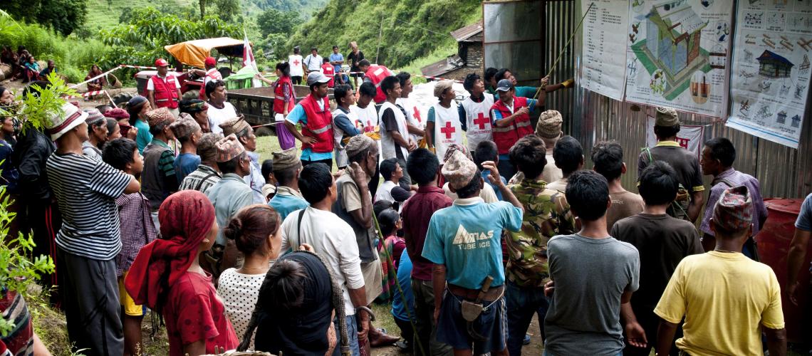 Crowd of people in a small village