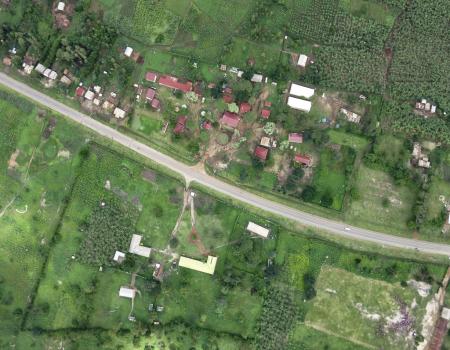 Aerial view of small cluster of buildings