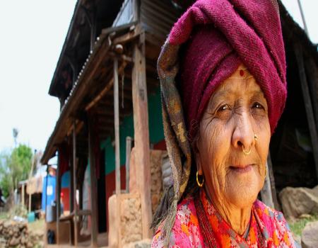 Closeup shot of a mature woman wearing a head scarf