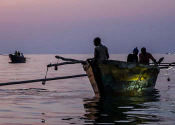 tanzanian fishermen on a boat on the lake